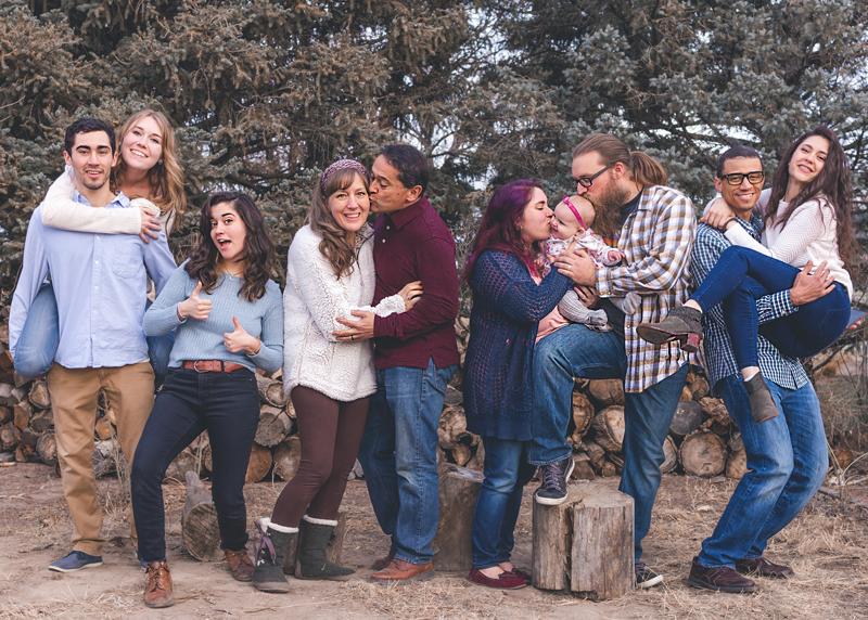 Four couples of various ethnicities showing families.